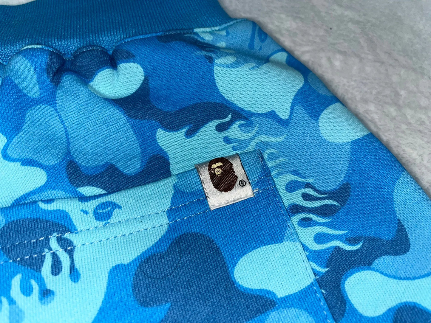 BAPE FIRE CAMO SWEAT SHORTS BLUE