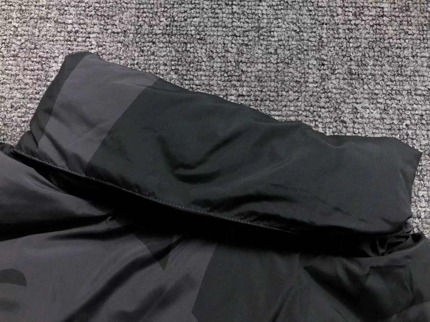 KAWS X THE NORTH FACE RETRO 1996 NUPTSE JACKET BLACK