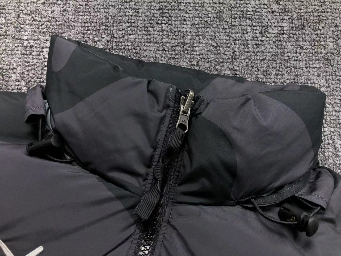 KAWS X THE NORTH FACE RETRO 1996 NUPTSE JACKET BLACK