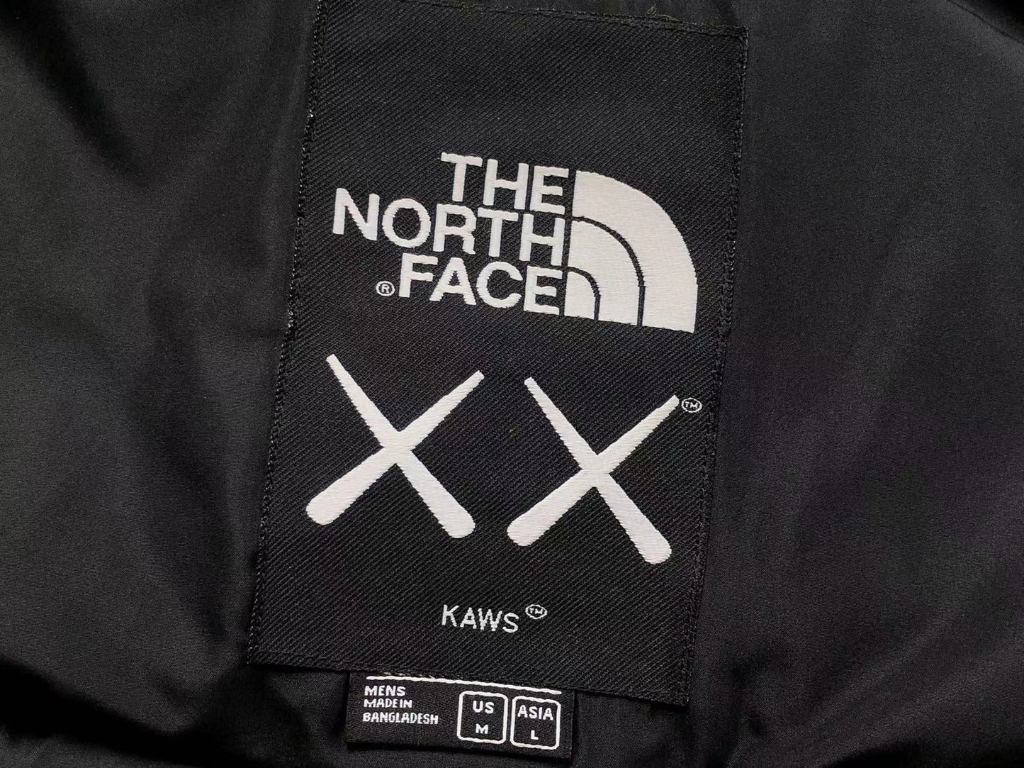 KAWS X THE NORTH FACE RETRO 1996 NUPTSE JACKET BLACK