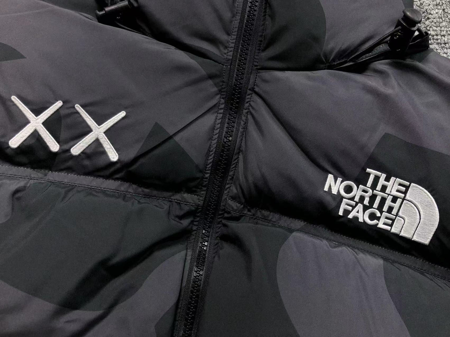 KAWS X THE NORTH FACE RETRO 1996 NUPTSE JACKET BLACK