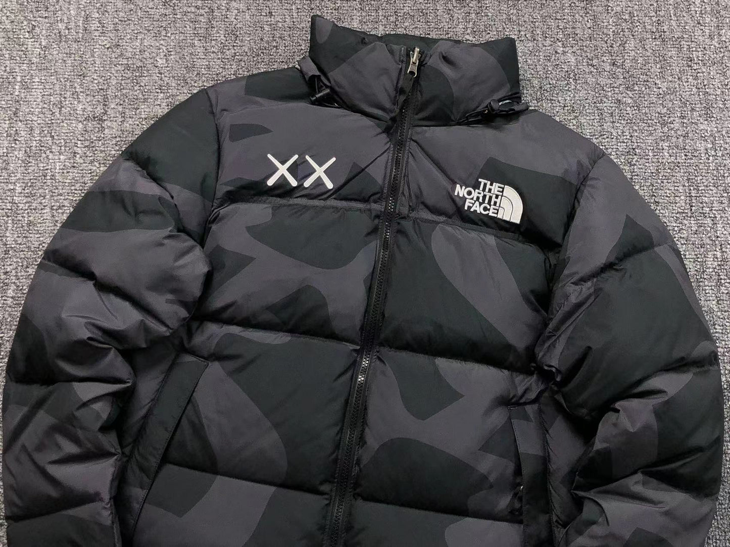 KAWS X THE NORTH FACE RETRO 1996 NUPTSE JACKET BLACK