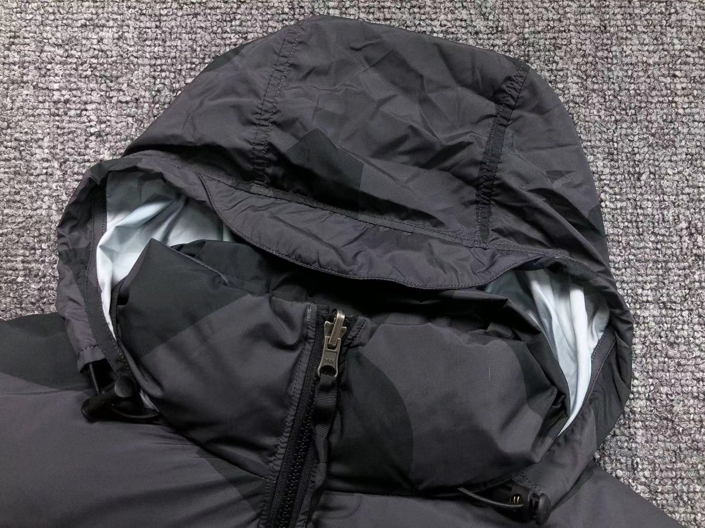 KAWS X THE NORTH FACE RETRO 1996 NUPTSE JACKET BLACK