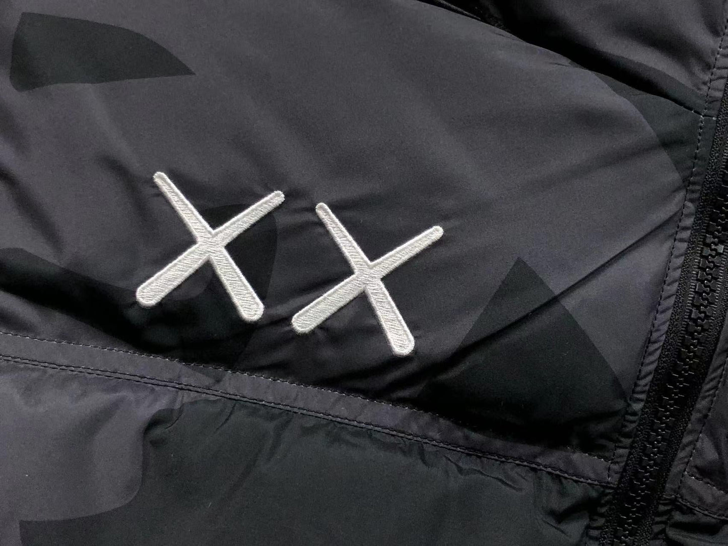 KAWS X THE NORTH FACE RETRO 1996 NUPTSE JACKET BLACK