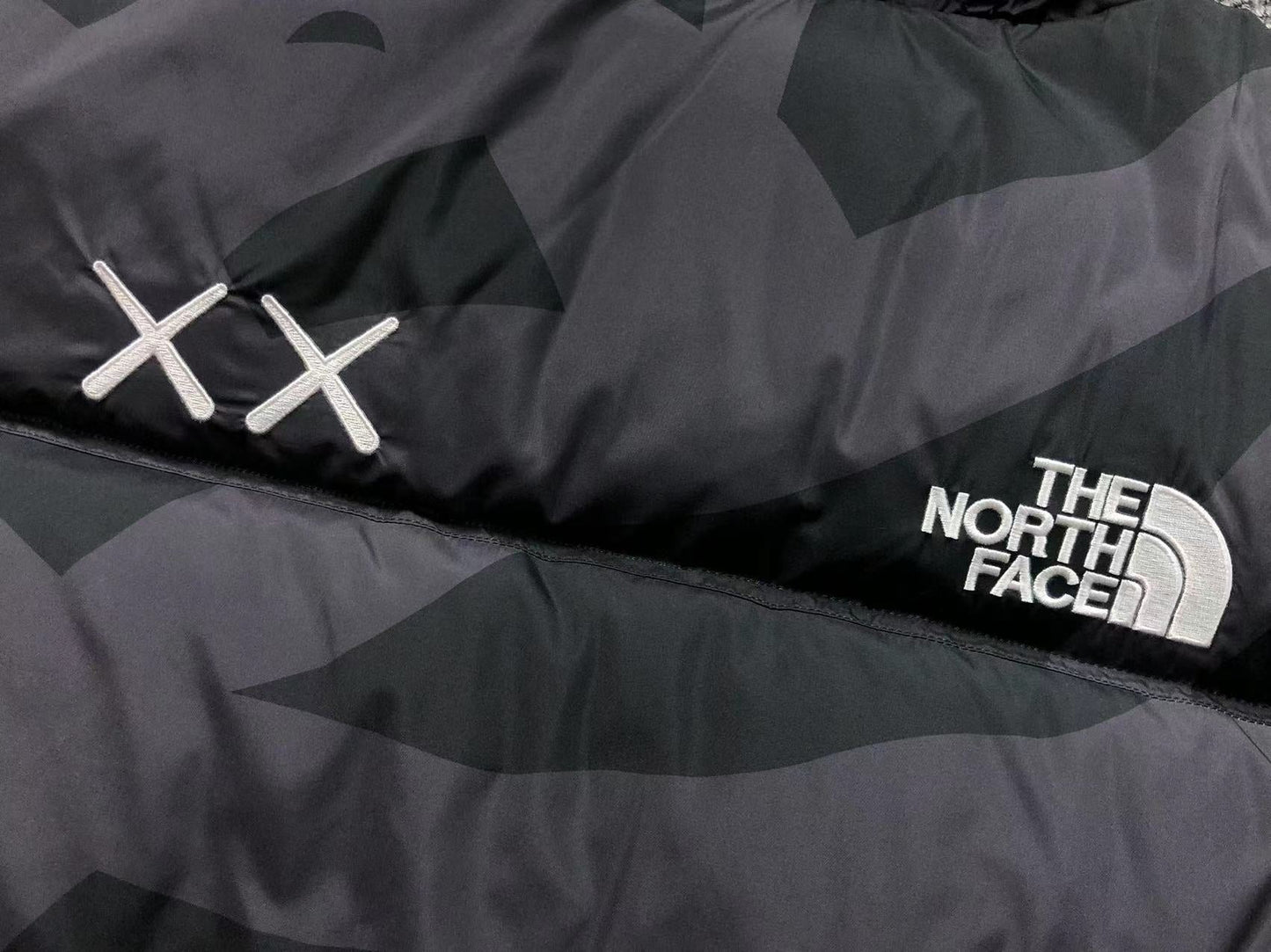 KAWS X THE NORTH FACE RETRO 1996 NUPTSE JACKET BLACK