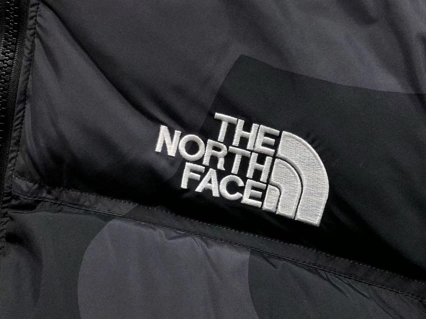 KAWS X THE NORTH FACE RETRO 1996 NUPTSE JACKET BLACK