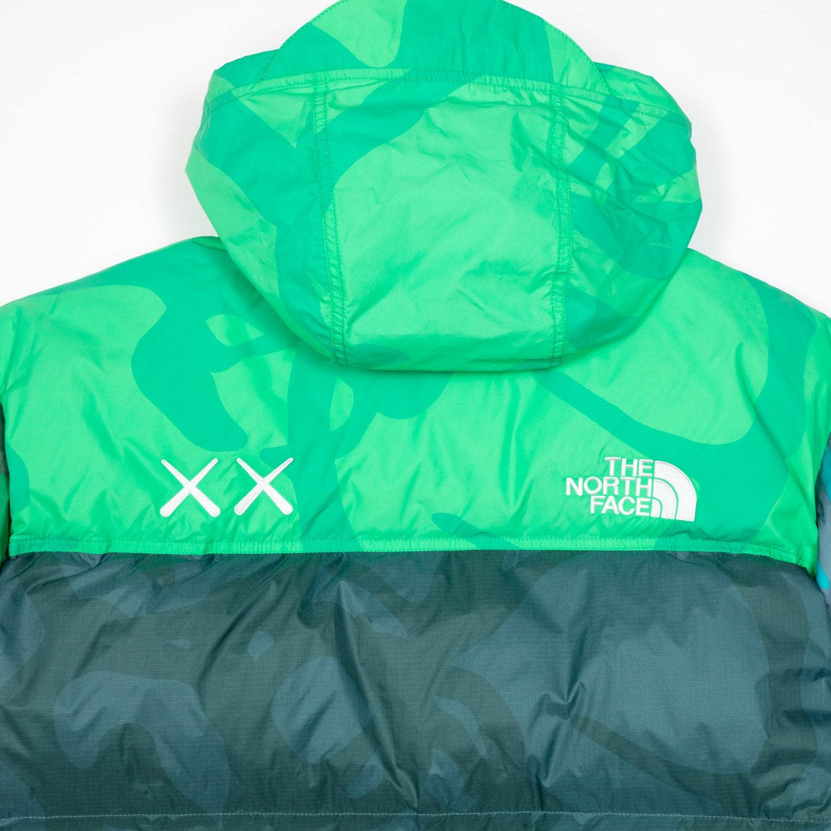 KAWS X THE NORTH FACE RETRO 1996 NUPTSE JACKET SAFETY GREEN