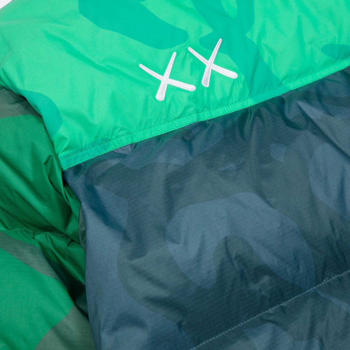 KAWS X THE NORTH FACE RETRO 1996 NUPTSE JACKET SAFETY GREEN