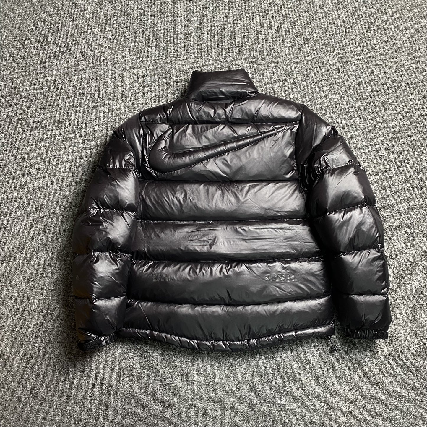 NIKE X NOCTA SUNSET PUFFER JACKET BLACK
