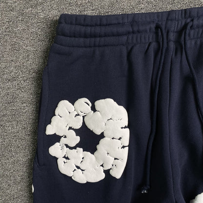 DENIM TEARS THE COTTON WREATH SWEATPANTS NAVY