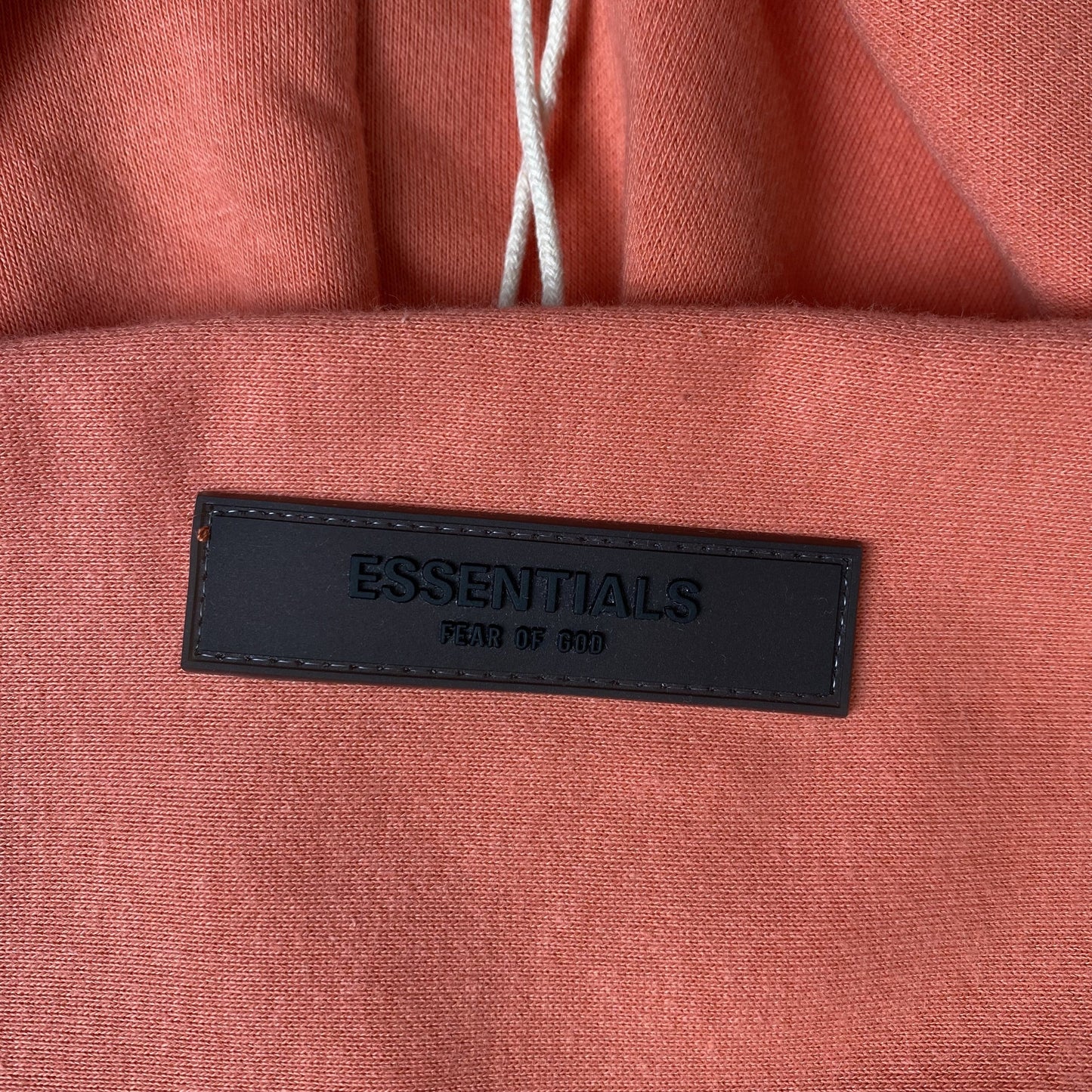 FEAR OF GOD ESSENTIALS HOODIE CORAL