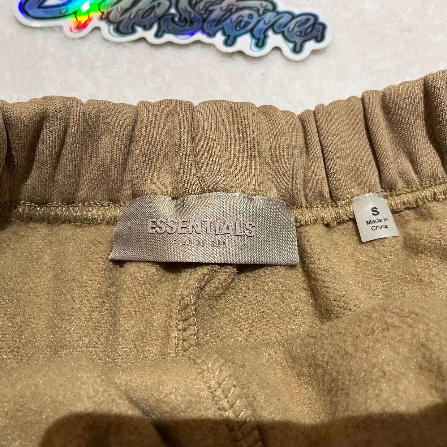 FEAR OF GOD ESSENTIALS SHORTS OAK