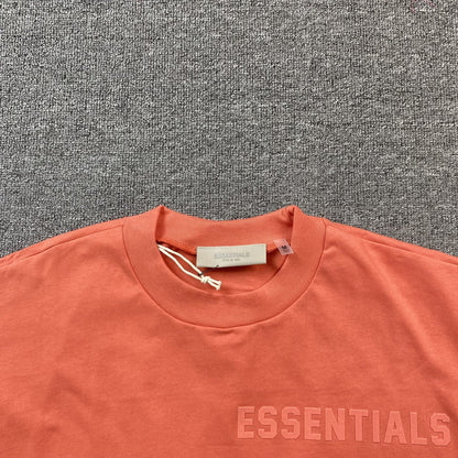 FEAR OF GOD ESSENTIALS TEE CORAL