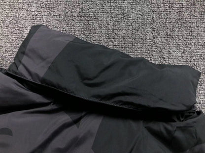 KAWS X THE NORTH FACE RETRO 1996 NUPTSE JACKET BLACK