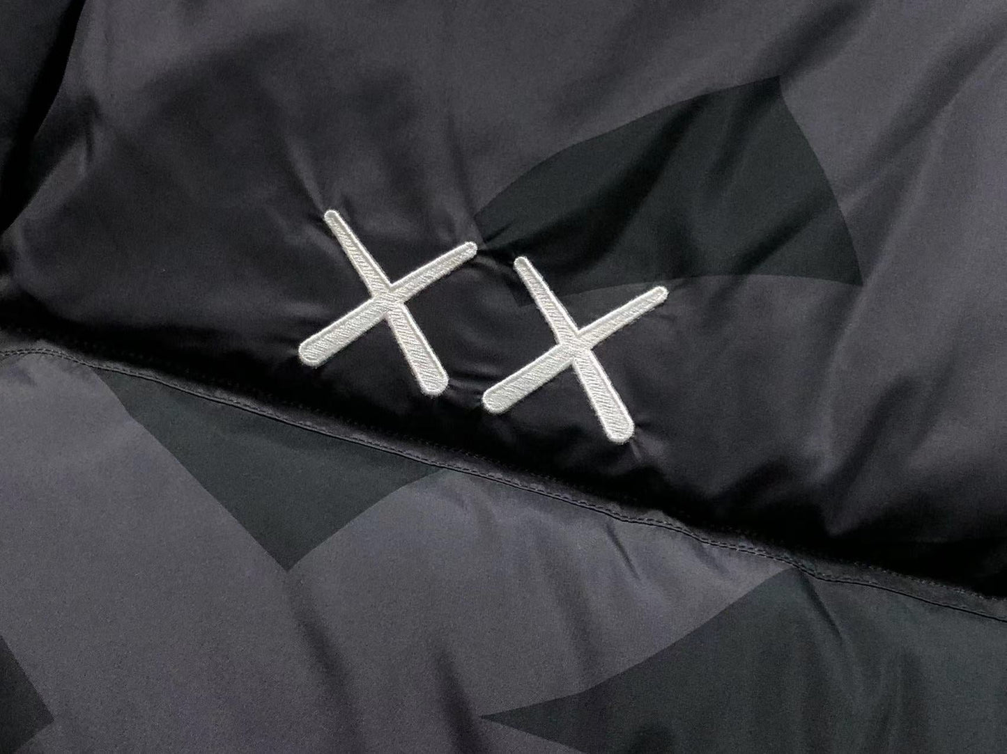 KAWS X THE NORTH FACE RETRO 1996 NUPTSE JACKET BLACK