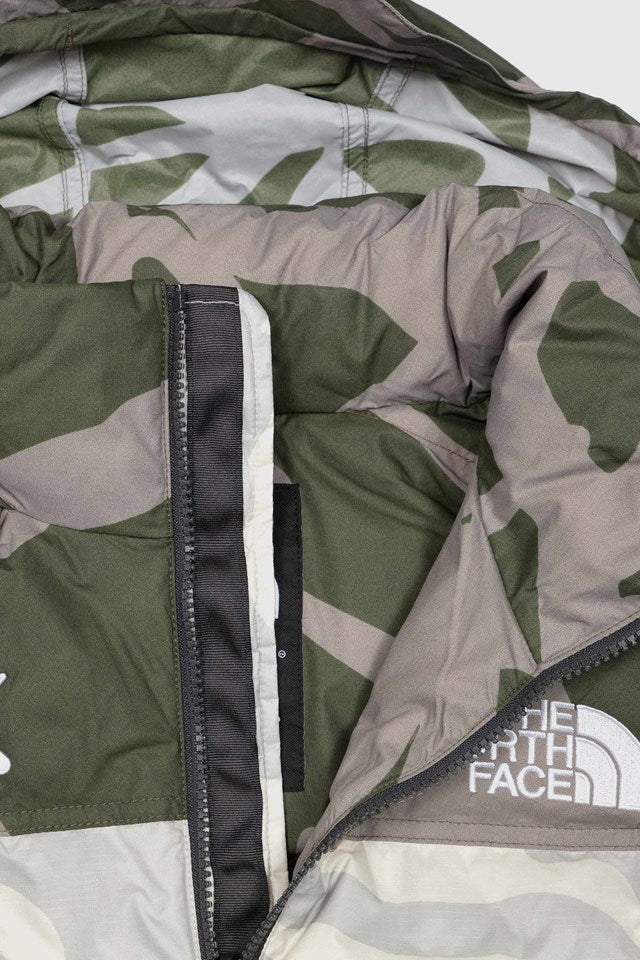 KAWS X THE NORTH FACE RETRO 1996 NUPTSE JACKET MOONLIGHT IVORY