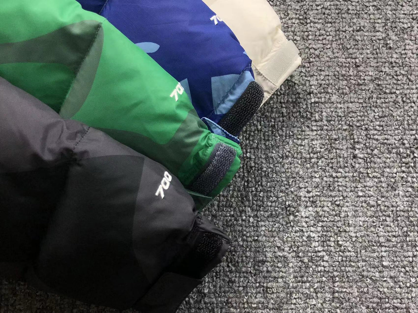 KAWS X THE NORTH FACE RETRO 1996 NUPTSE JACKET MOONLIGHT IVORY
