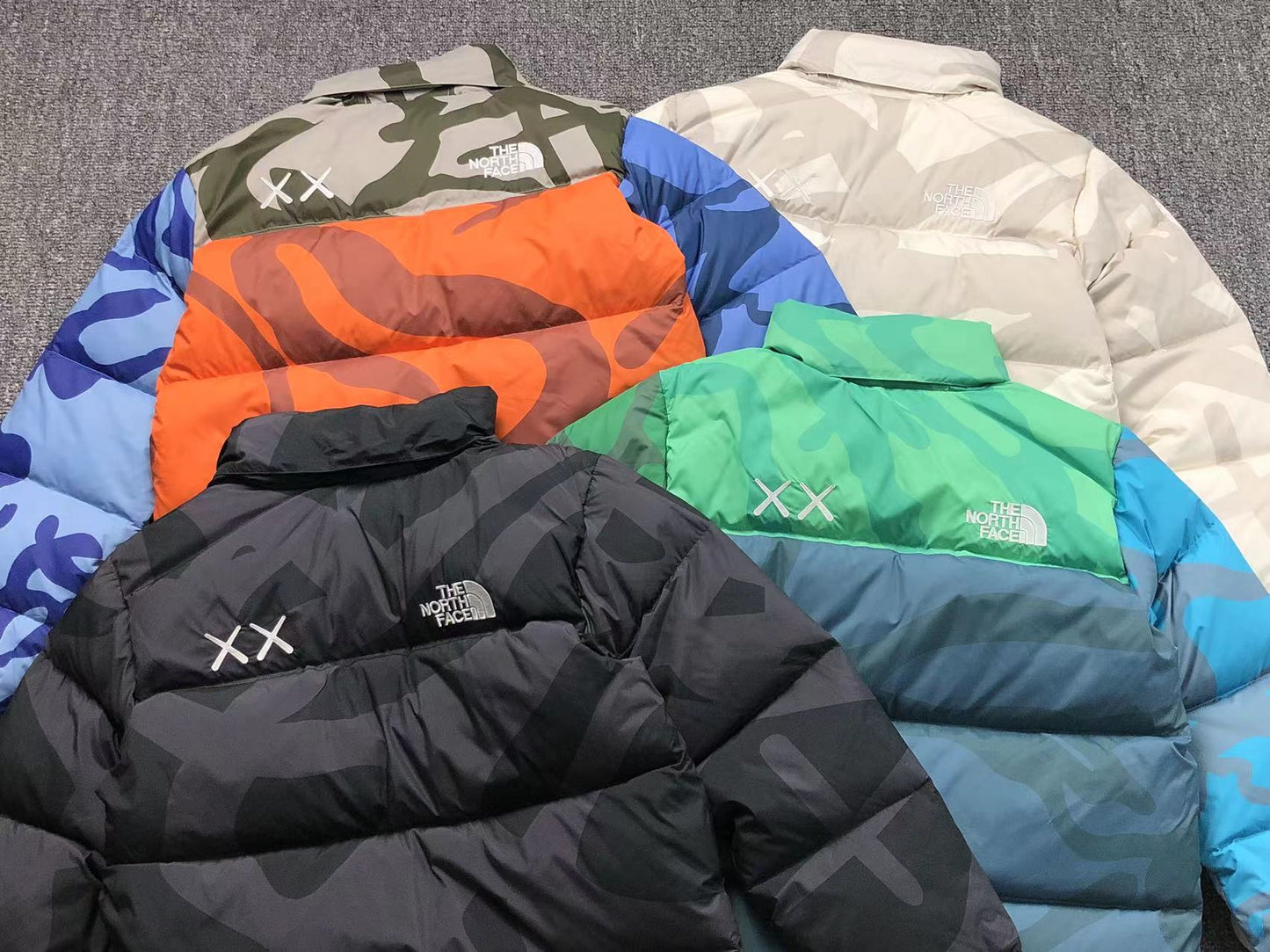 KAWS X THE NORTH FACE RETRO 1996 NUPTSE JACKET MOONLIGHT IVORY