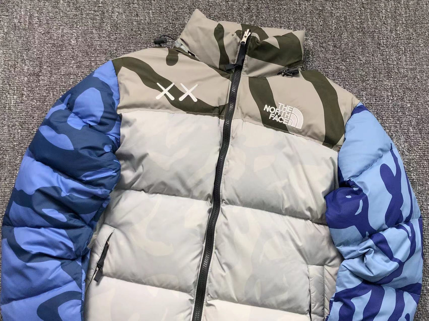 KAWS X THE NORTH FACE RETRO 1996 NUPTSE JACKET MOONLIGHT IVORY