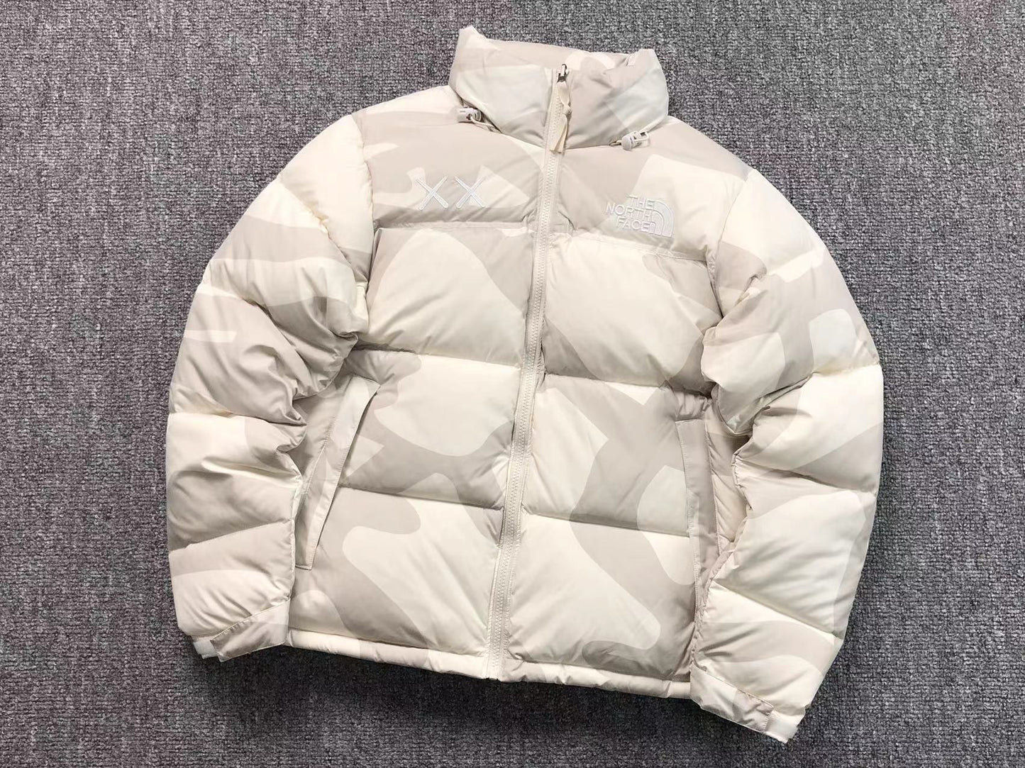 KAWS X THE NORTH FACE RETRO 1996 NUPTSE JACKET MOONLIGHT IVORY