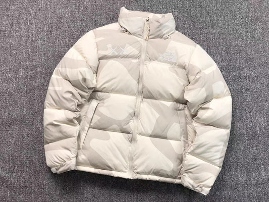 KAWS X THE NORTH FACE RETRO 1996 NUPTSE JACKET MOONLIGHT IVORY