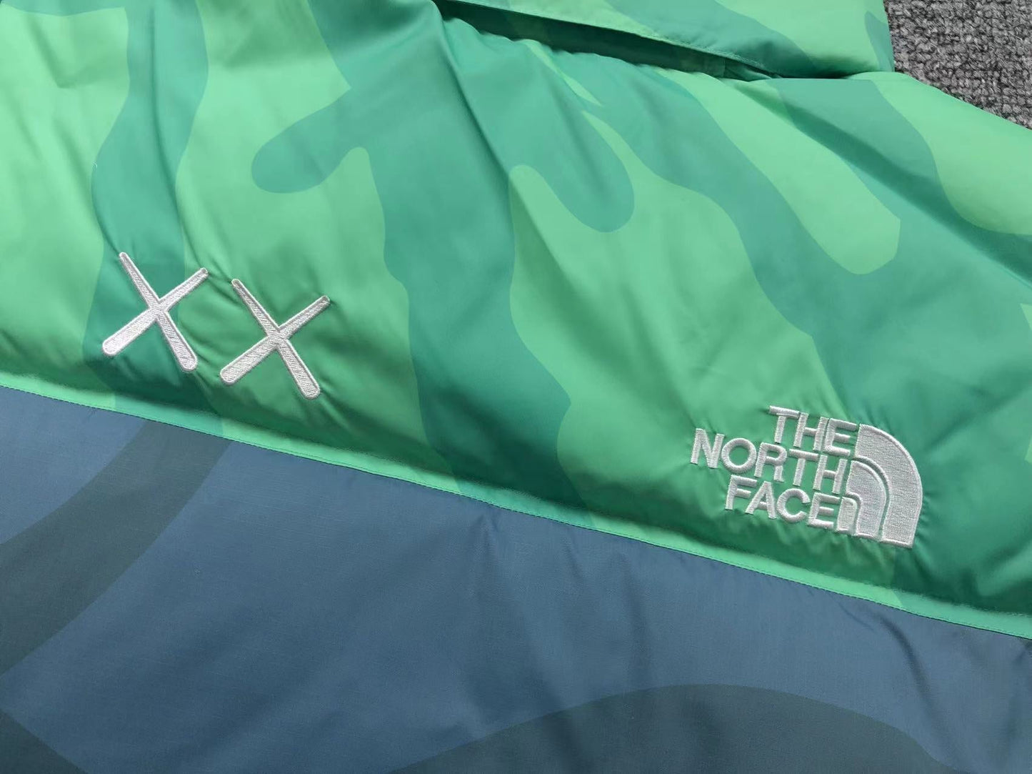 KAWS X THE NORTH FACE RETRO 1996 NUPTSE JACKET SAFETY GREEN