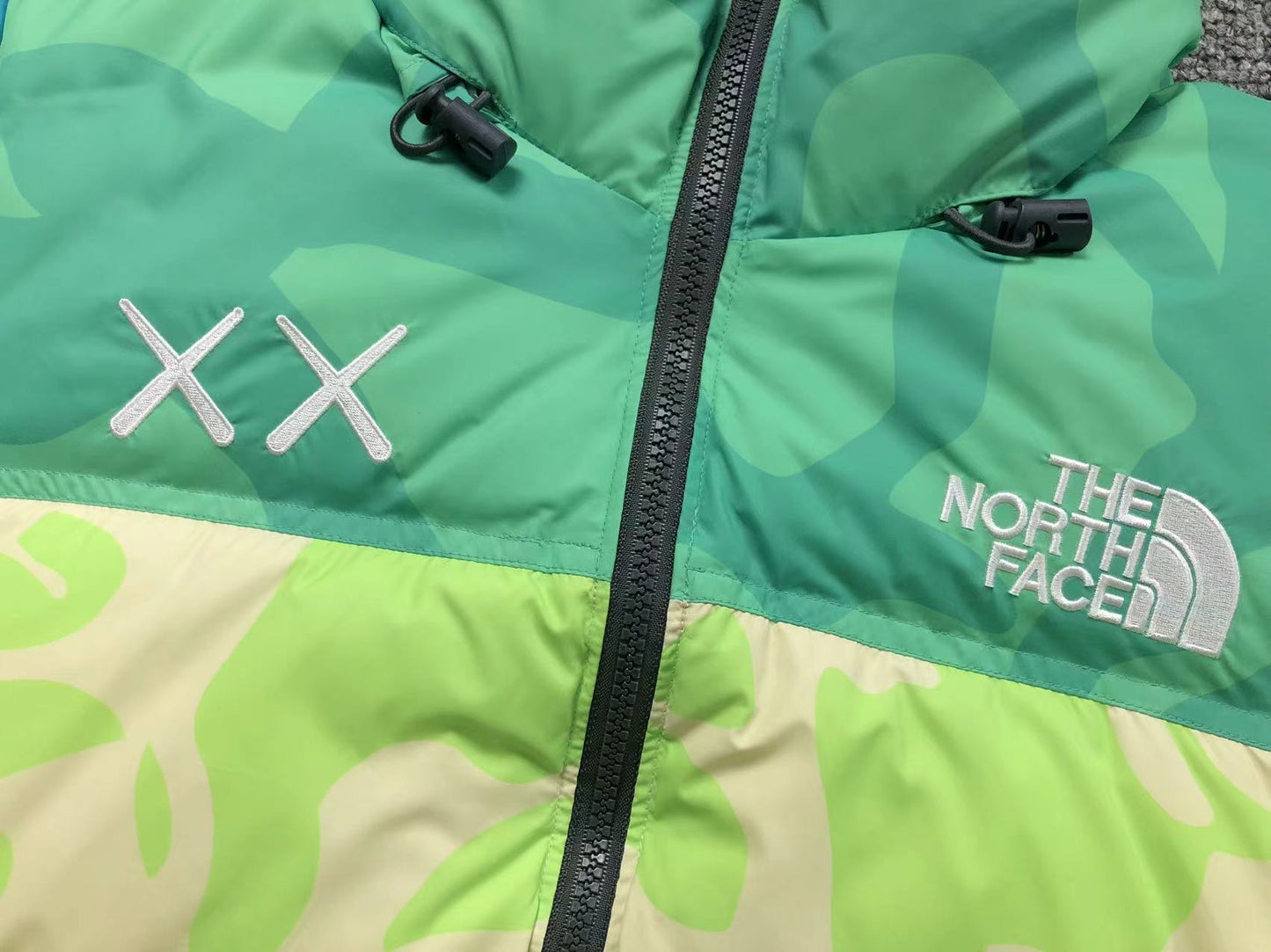 KAWS X THE NORTH FACE RETRO 1996 NUPTSE JACKET SAFETY GREEN