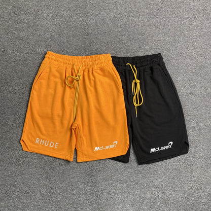 RHUDE X MCLAREN SHORTS ORANGE